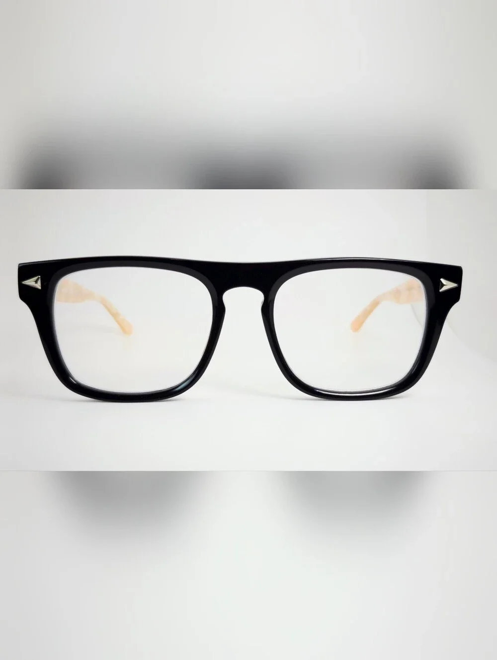 Fluoresce. Black Wayfarer-Style Eyeglasses with Pearl Temples.